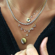 Gold and Diamond Evil Eye Coin Necklace layered