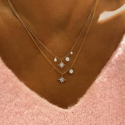 Yellow Gold Starburst Diamond Charm Necklace on model