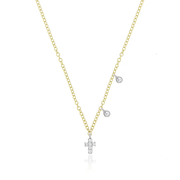 Yellow Gold Dainty Cross and Bezel Diamond Necklace layered on model