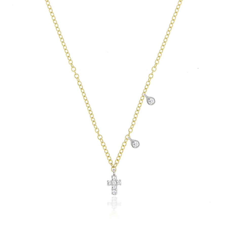 Yellow Gold Dainty Cross and Bezel Diamond Necklace layered on model