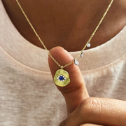 Gold and Diamond Evil Eye Coin Necklace lifestyle